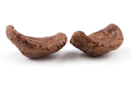 Chocolate cereals on a white background.の写真素材