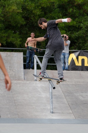 ILHAVO, PORTUGAL - AUGUST 13: Rafael Pinto on a frontside boardslide during the Skate Open Ilhavo on August 13, 2011 in Ãlhavo, Portugal.のeditorial素材