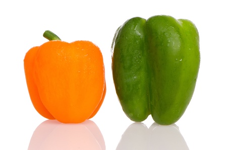 Two fresh peppers on white background.の写真素材