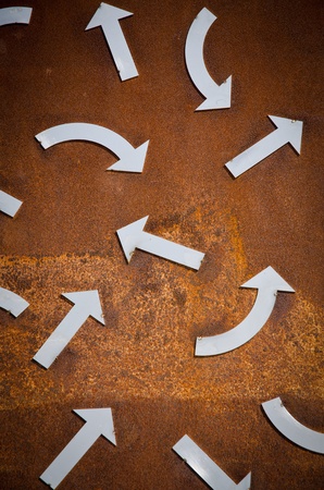 Rusty turn arrow signs background.の写真素材