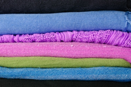 Pile of colorful scarves, can work as a background.