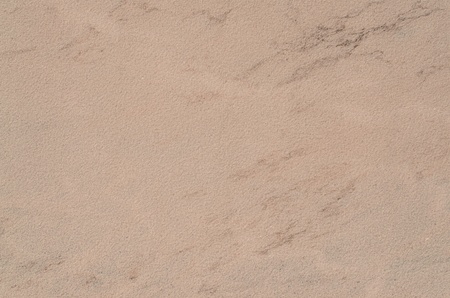 Brown ceramic floor tile closeup texture.の写真素材