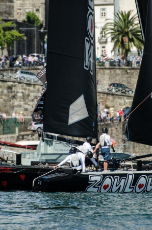 PORTO, PORTUGAL - JULY 07: ZouLou compete in the Extreme Sailing Series boat race on july 07, 2012 in Porto, Portugal.のeditorial素材