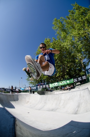 VISEU, PORTUGAL - JULY 22: Joao Sa grab during pool trainings at DC Skate challenge by MEO on july 22, 2012 in Viseu, Portugal.のeditorial素材
