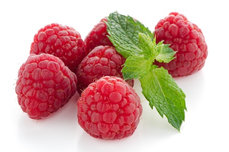 Ripe red raspberry on white background