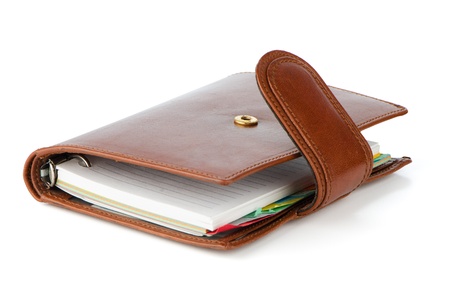 Brown business book isolated on white background の写真素材