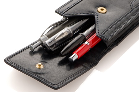 Leather pencil case isolated on white background.