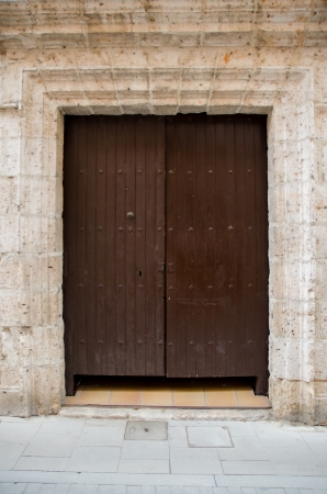 Old wooden entrance door in Valladolid,  Castilla y Leon , Spain の写真素材