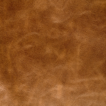 Brown leather texture closeup background の写真素材