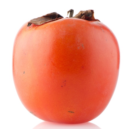 Orange ripe persimmon isolated over white background.の写真素材