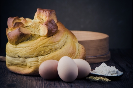 Traditional Portuguese cake, called Fogaca, from Feira, Portugal, on wooden table 