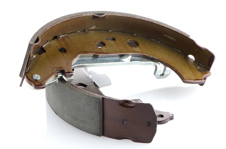 Car brake pads on white reflective background.の写真素材