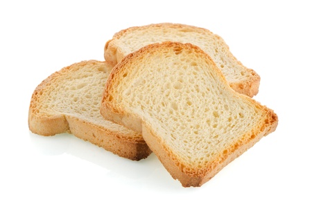 Several pieces of golden brown toast on white background.