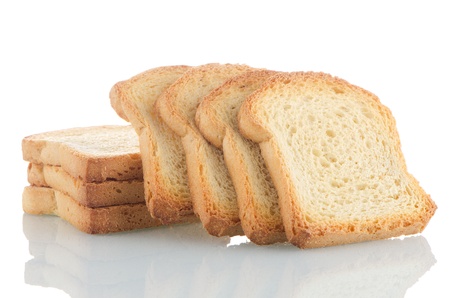 Several pieces of golden brown toast on white background.