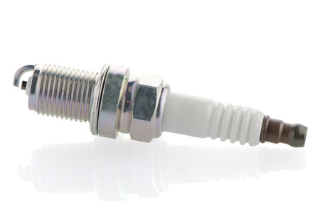 Spark-plug on white reflective backgroundの写真素材