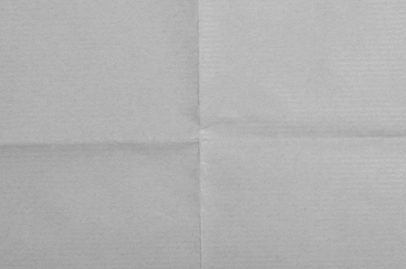 Recycled paper texture closeup background.