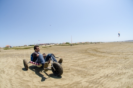 ILHAVO, PORTUGAL - MAY 12: Filipe Lemos on a Kitebuggy during the Festival do Vento  on may 12, 2013 in Ilhavo, Portugal.のeditorial素材
