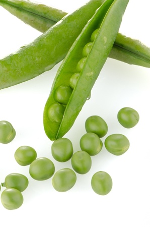 Fresh green pea pod on white backgroundの写真素材