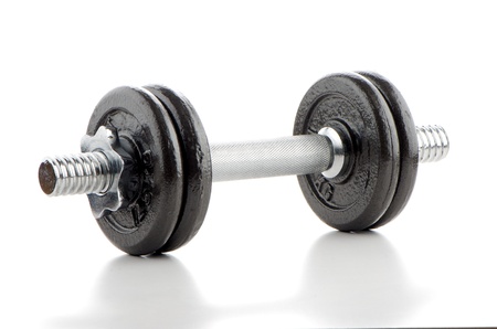 Fitness exercise equipment dumbbell weight on white background.の写真素材