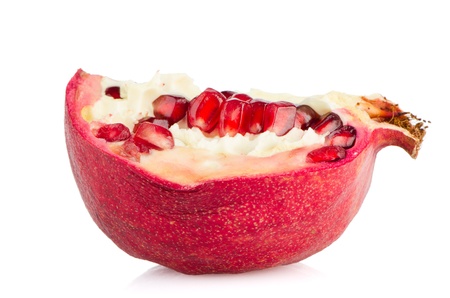 Half ripe pomegranate fruit isolated on white background.の写真素材