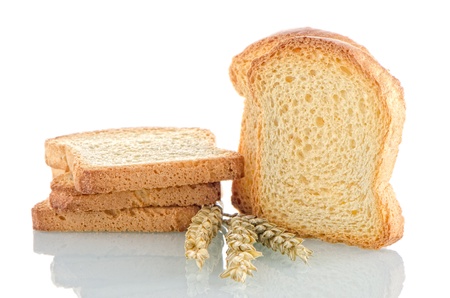 Several pieces of golden brown toast on white background の写真素材