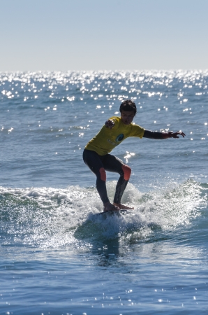 OVAR, PORTUGAL - AUGUST 18: Sebastiao Maia at 1st stage of National Longboard Championship  on august 18, 2013 in Ovar, Portugal.のeditorial素材