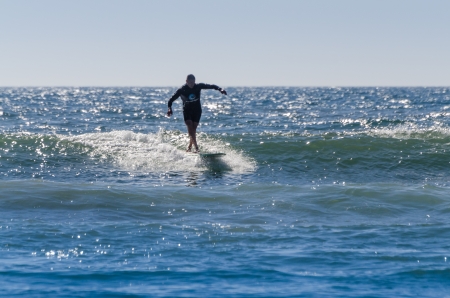 OVAR, PORTUGAL - AUGUST 18: Luis Cruz at 1st stage of National Longboard Championship  on august 18, 2013 in Ovar, Portugal.のeditorial素材