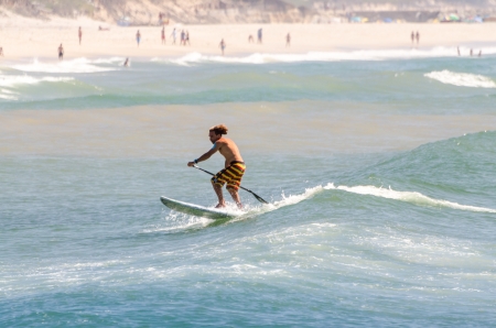 OVAR, PORTUGAL - AUGUST 18: Pedro Casqueira at 4st stage of National Stand up paddle Championship  on august 18, 2013 in Ovar, Portugal.のeditorial素材