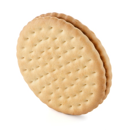 Sandwich biscuits with chocolate filling on a white backgroundの写真素材