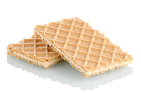 Vanilla wafers on white reflective background.の写真素材