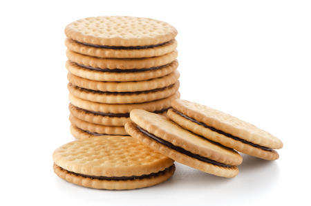 Sandwich biscuits with chocolate filling on a white backgroundの写真素材