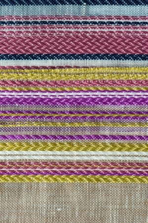 Closeup detail of multi color fabric texture.