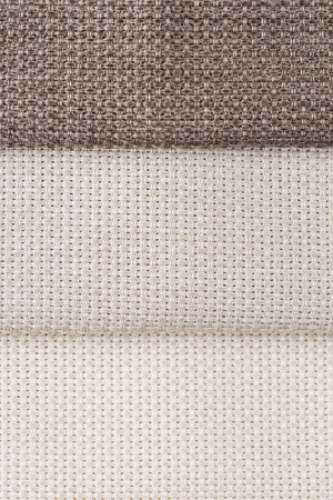 Closeup detail of beige fabric texture background の写真素材