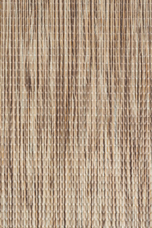 Closeup detail of brown fabric texture background.
