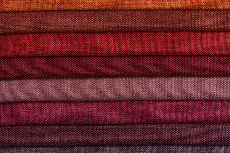 Closeup detail of multi color fabric texture samples.