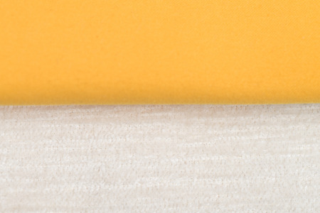 Closeup detail of yellow fabric texture background.の写真素材
