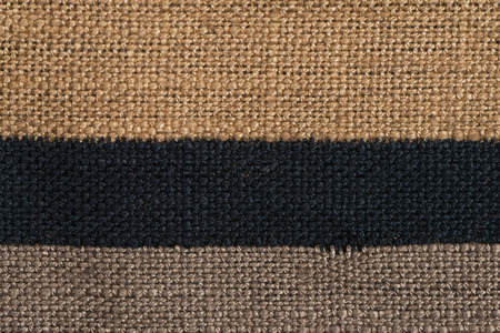 Closeup detail of fabric with brown horizontal stripes pattern.の写真素材