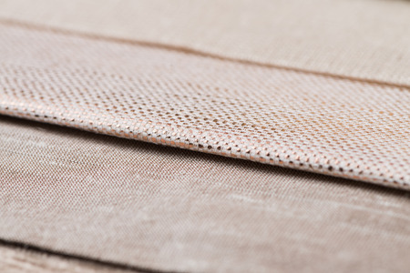 Closeup detail of multi color fabric texture samples.