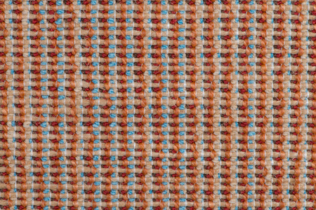 Closeup detail of orange carpet texture background.
