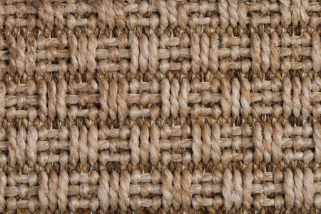 Closeup detail of brown carpet texture background.