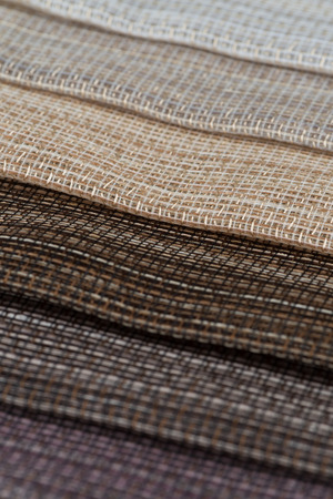 Closeup detail of multi color fabric samples texture background.の写真素材