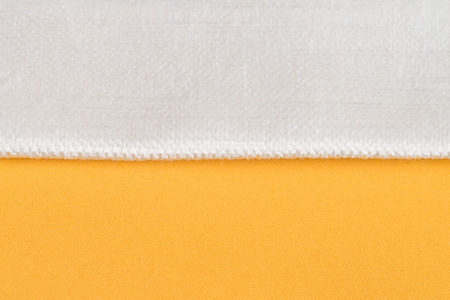 Closeup detail of yellow fabric texture background.の写真素材