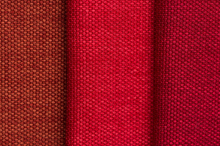 Closeup detail of red fabric texture background.の写真素材