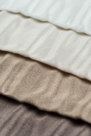 Closeup detail of brown fabric texture background.の写真素材