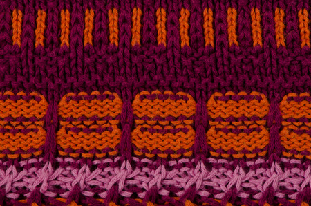 Close up macro background texture of striped knitted texture.