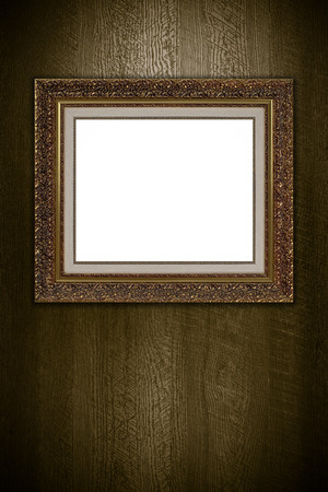 Old picture frame on vintage wood wall.の写真素材
