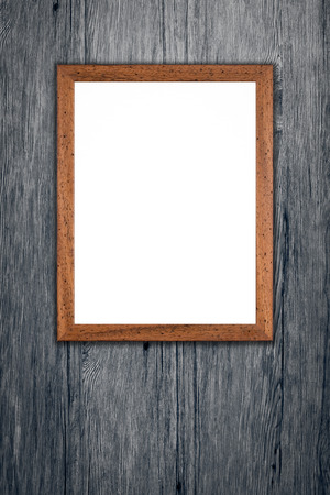 Old picture frame on vintage wood wall.の写真素材