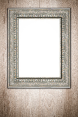 Old picture frame on vintage wood wall.の写真素材