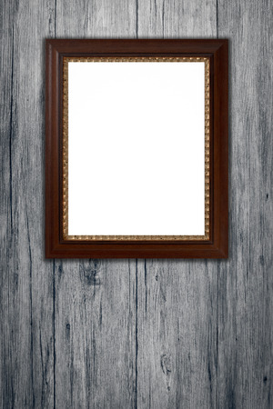 Old picture frame on vintage wood wall.の写真素材