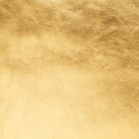 Closeup of golden color leather texture background.の写真素材